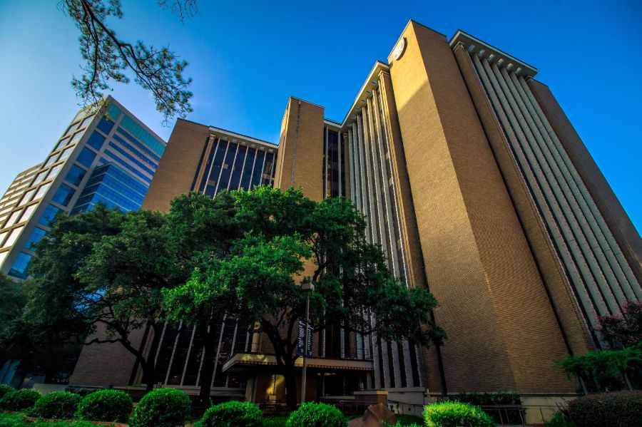 Photo of RAS building with trees in foreground.