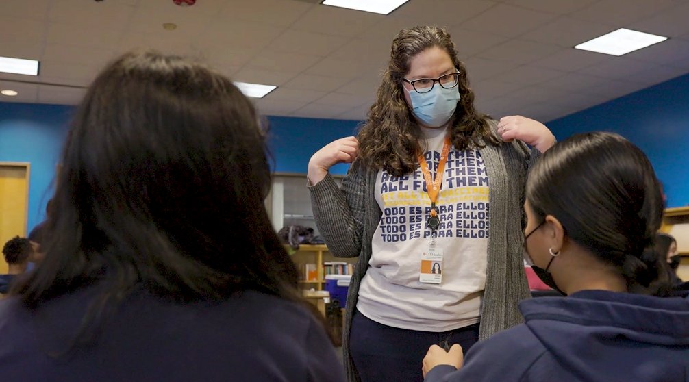 Efrat Gabay, MPH, senior program manager of All for Them, talks with middle school students during a recent vaccination clinic in Houston.