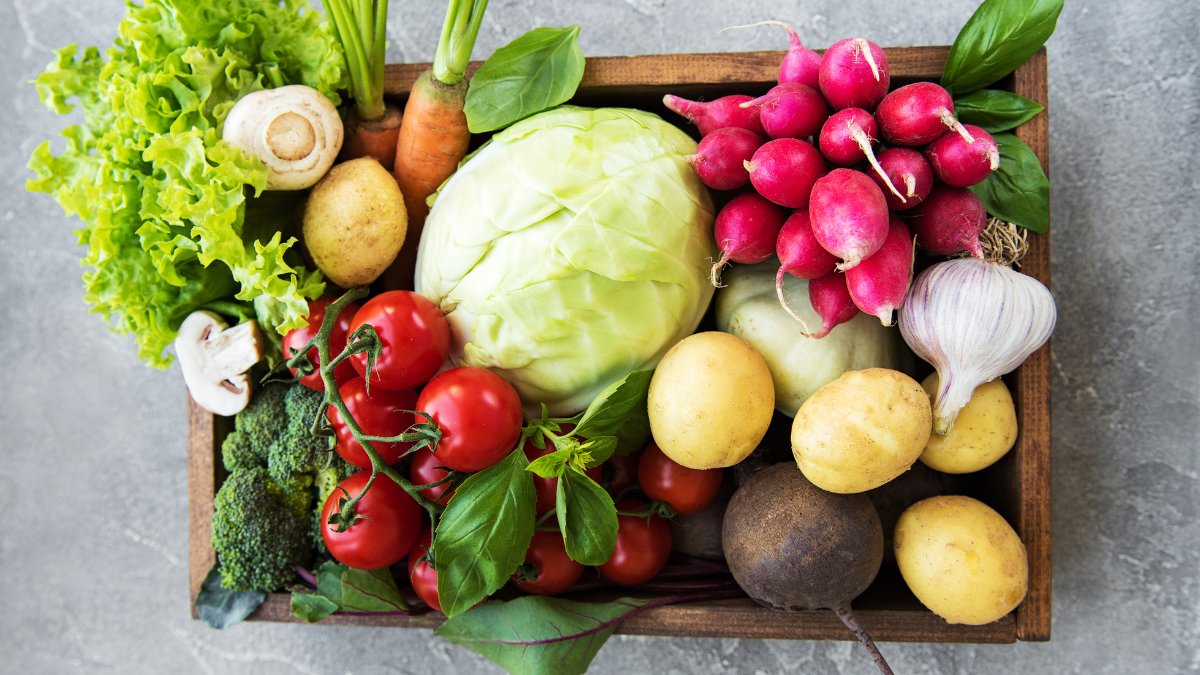 Photo of produce box filled with colorful fruits and vegetables.