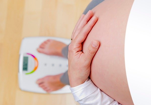 New research led by UTHealth shows that a mother's obesity during pregnancy is associated with an increased risk of colon cancer in her adult children. (Photo by Getty Images)