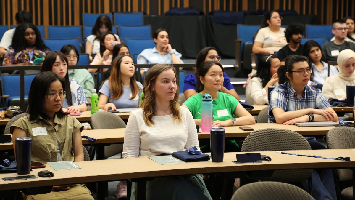Students sitting in auditorium