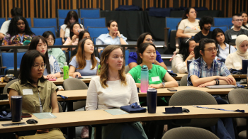 Students sitting in auditorium
