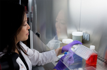 A woman in a lab with instruments. (UTHealth Houston file photo)