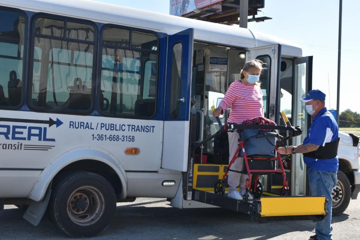 A client boarding a REAL, Inc. shuttle.