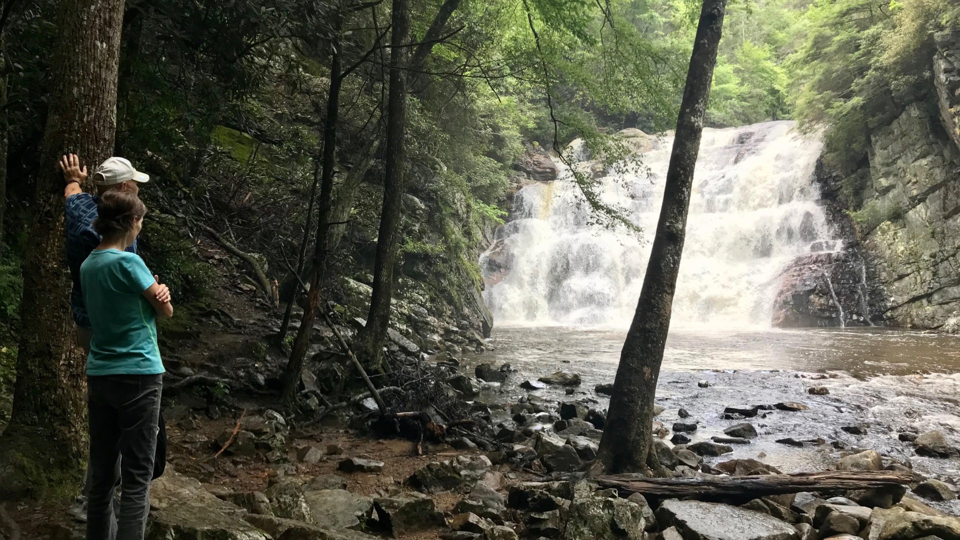 Robert and his wife Cathy Brown looking over waterfall in Tennessee after a hike