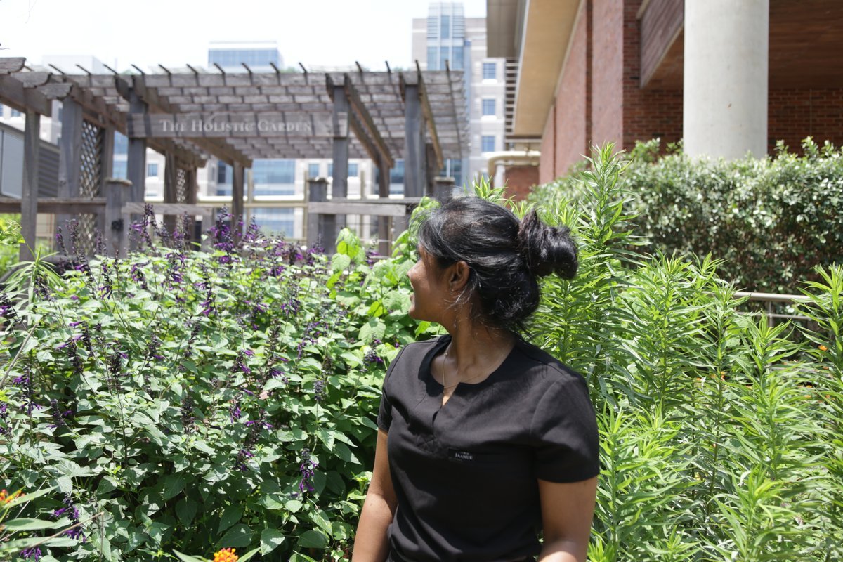 woman looking back at garden