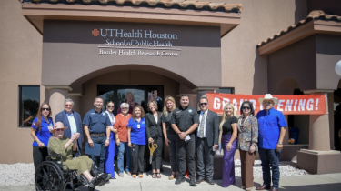 Group photo of Brownsville members in front of the Border Health Research Center