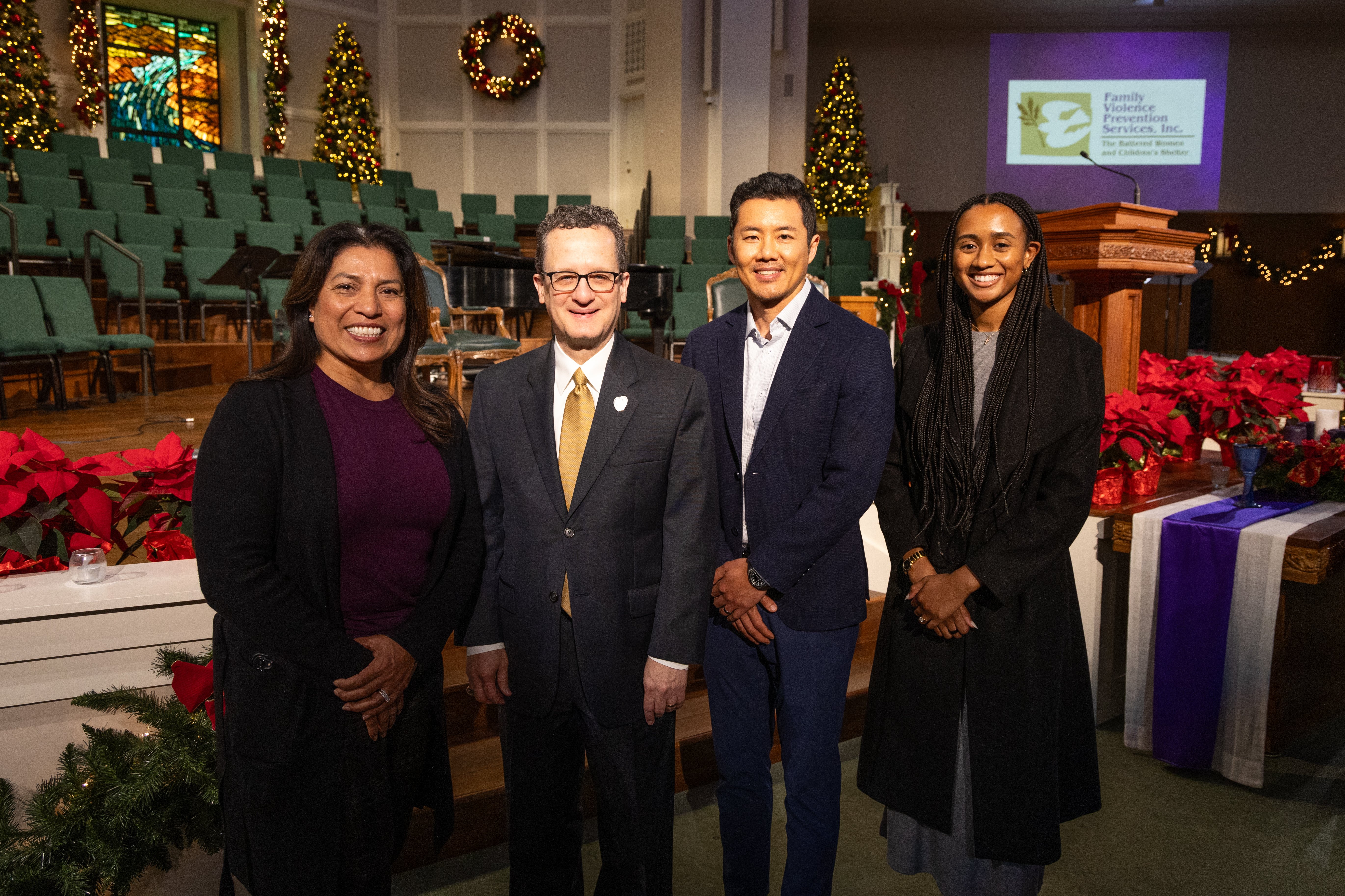 Jack Tsai, PhD, center, regional dean and professor in San Antonio, Jordan Perry, right,; Cody Knowlton, left, Baptist Health Foundation of San Antonio; and Nora Silva, from University Health.