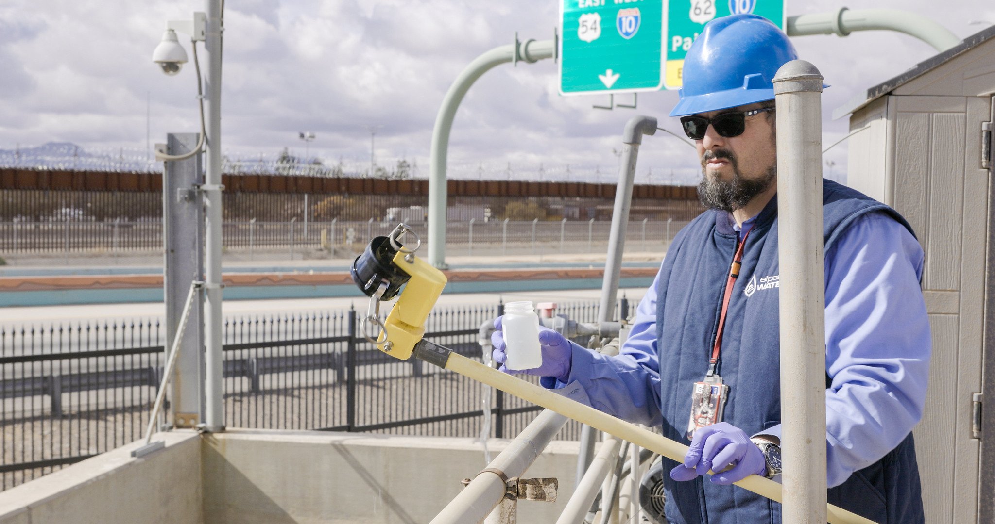 A worker at an El Paso Water Utility facility collects samples of wastewater prior to sending them to Baylor College of Medicine for analysis. (Photo courtesy of TEPHI/Texas Epidemic Public Health Institute)