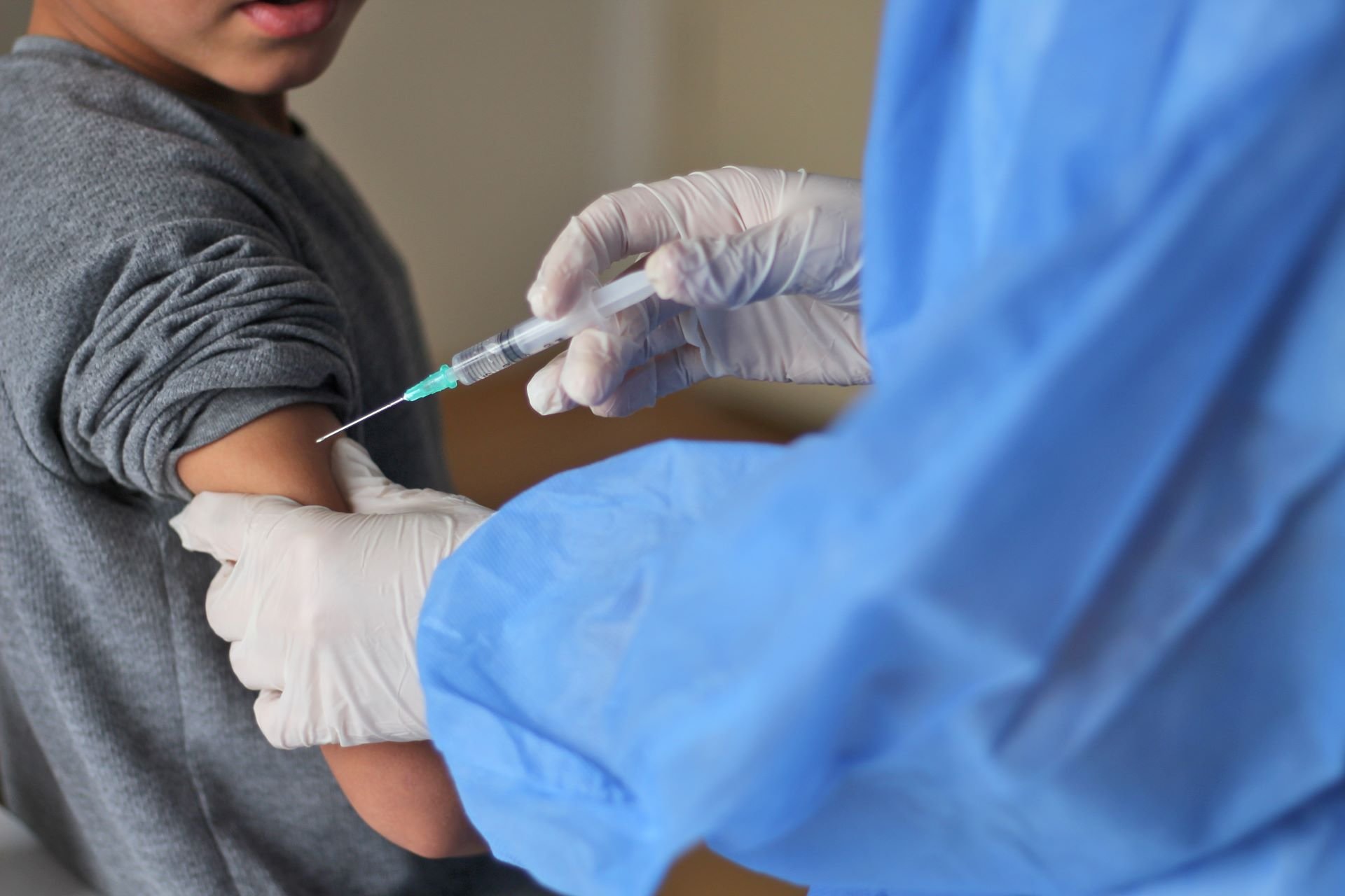 A child receiving a vaccination.