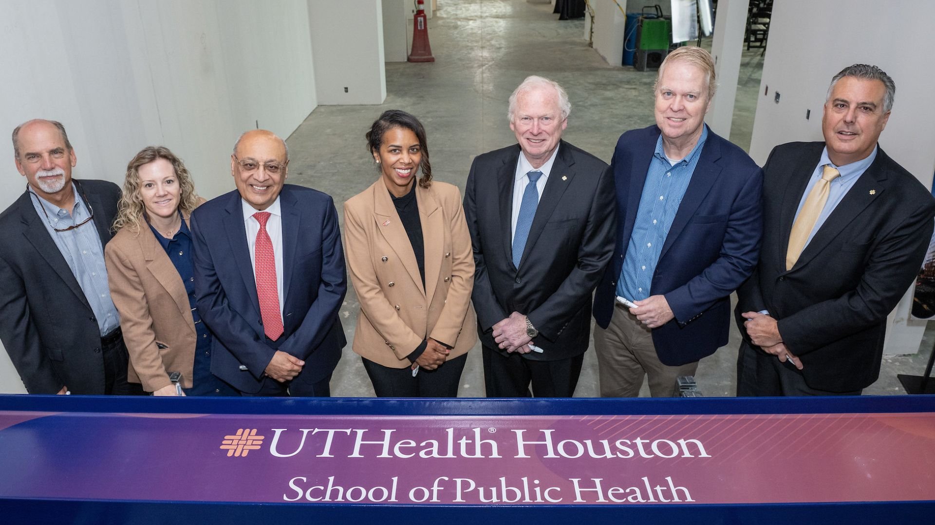 UTHealth Houston School of Public Health celebrated the final beam being placed on its new 10-story, 350,000-square-foot facility, currently under construction in the Texas Medical Center’s Helix Park. (Photo by Jacob Power)