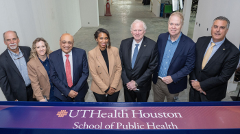 UTHealth Houston School of Public Health celebrated the final beam being placed on its new 10-story, 350,000-square-foot facility, currently under construction in the Texas Medical Center’s Helix Park. (Photo by Jacob Power)