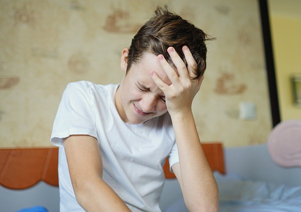 An international survey found that 27.5% of participants experienced cluster headaches as children, but only 15.2% of participants with pediatric onset were diagnosed before the age of 18. (Photo by Getty Images)