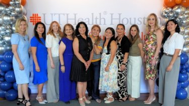 Group photo of brownsville members in front of 