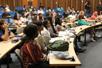 Students sitting in auditorium