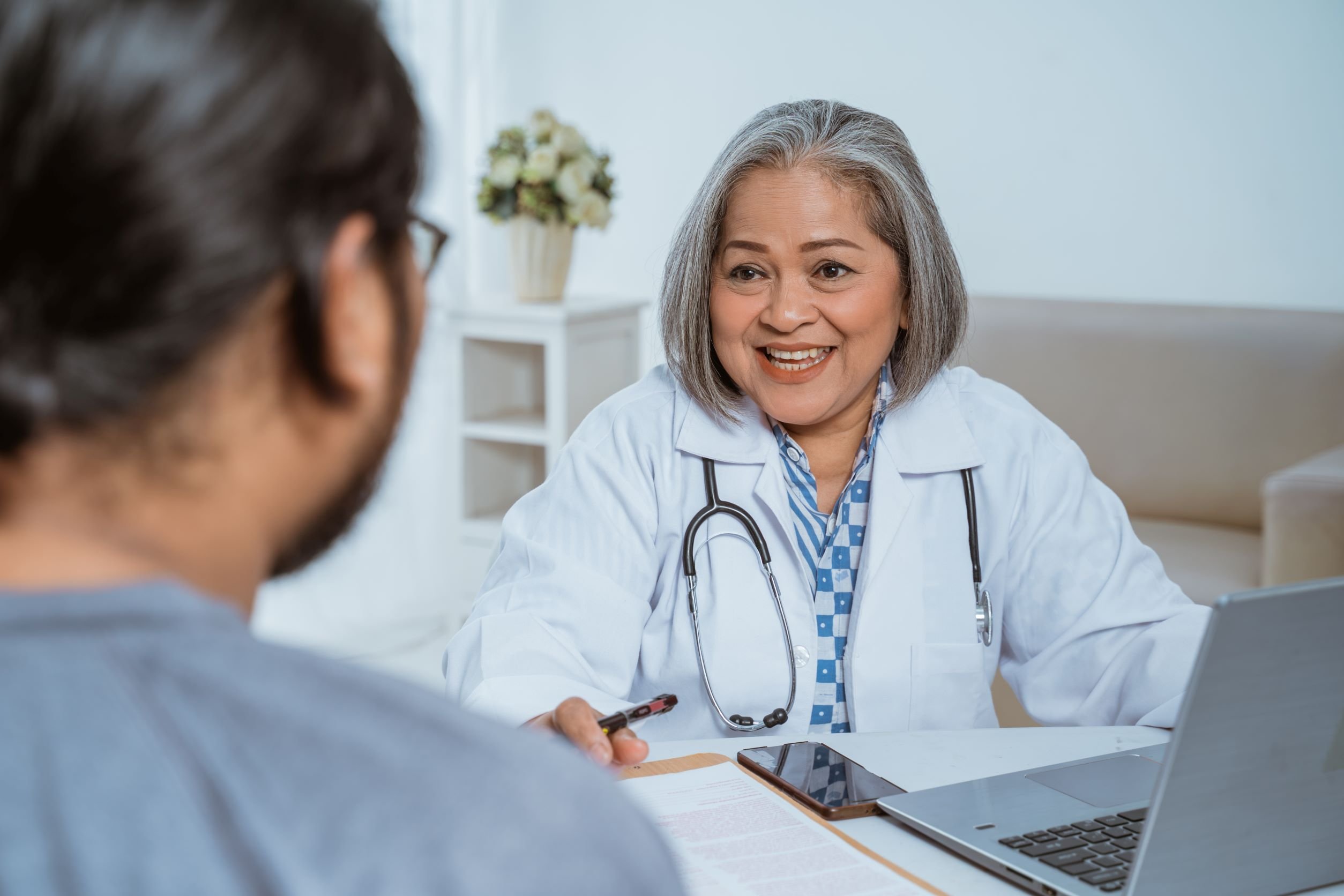 Provider speaking with patient.