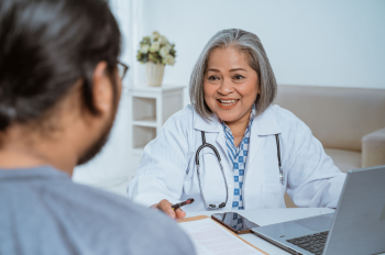 Provider speaking with patient.