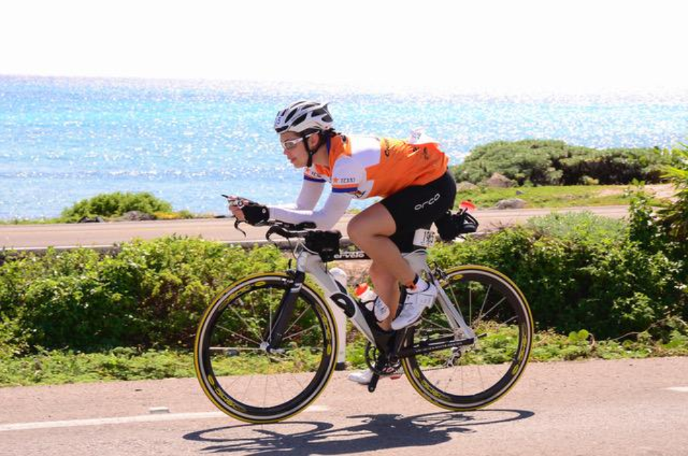 Gabriela Gallegos rides her bike