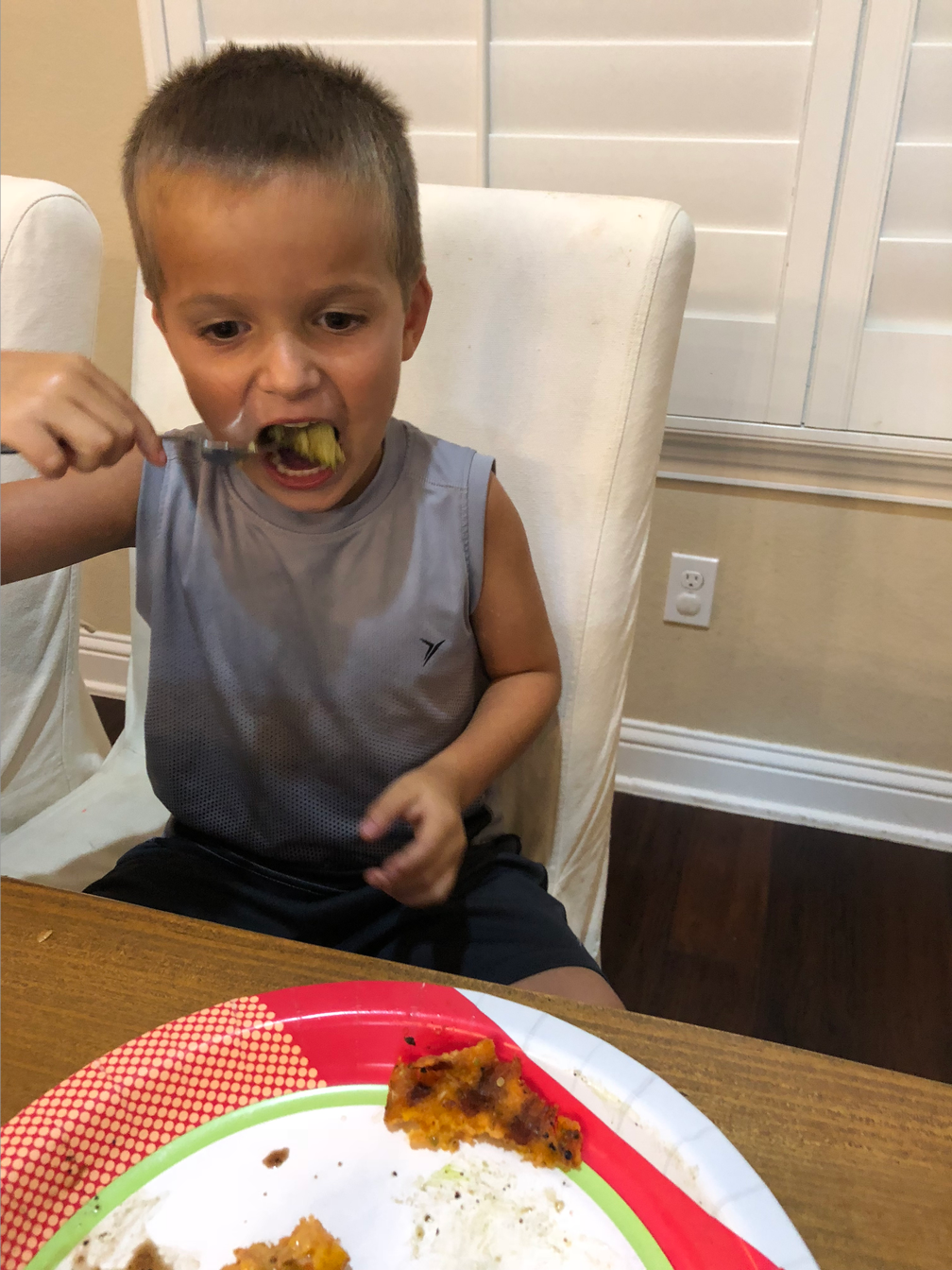 young boy eating