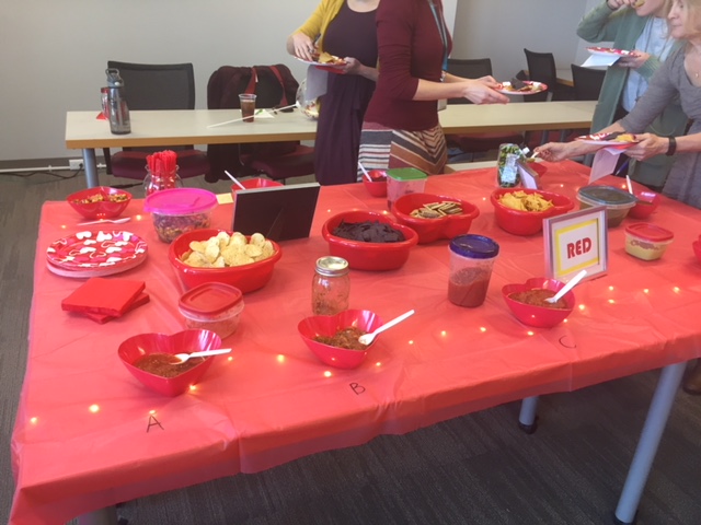 red table with hot sauce ingredients